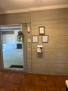 Lobby displaying agency licenses and credentials
